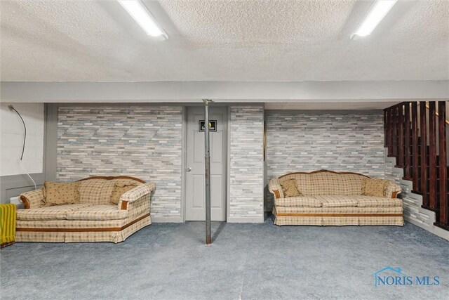 417 Indian Rd, Wauseon, OH 43567 - finished basement with a textured ceiling and carpet