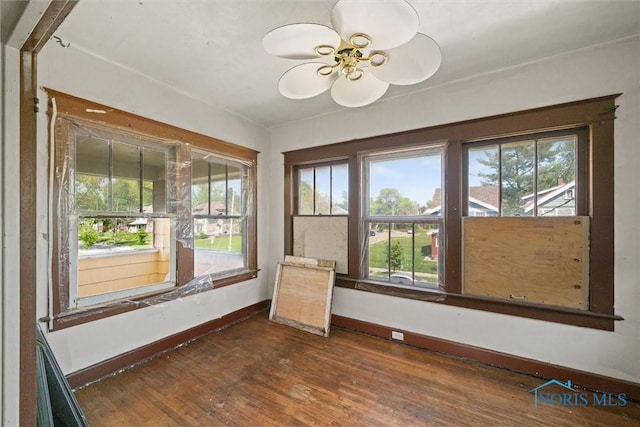 unfurnished sunroom with healthy amount of natural light