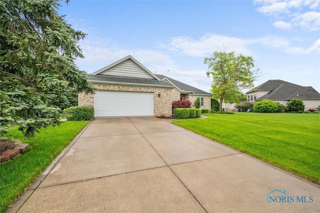 5723 Timbers Grn, Waterville, OH 43566 - ranch-style house featuring driveway, a garage, brick siding, and a front lawn