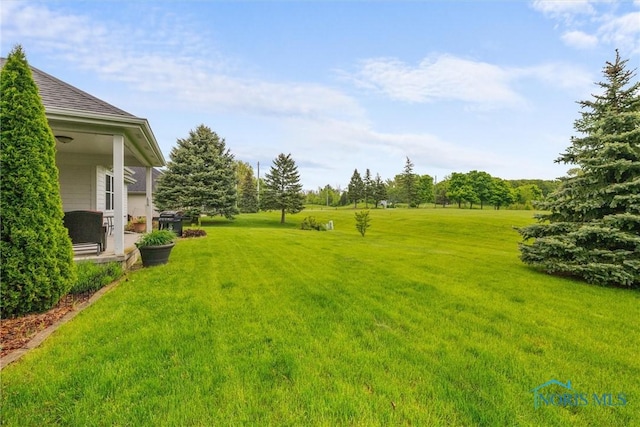 5723 Timbers Grn, Waterville, OH 43566 - view of green lawn with a patio