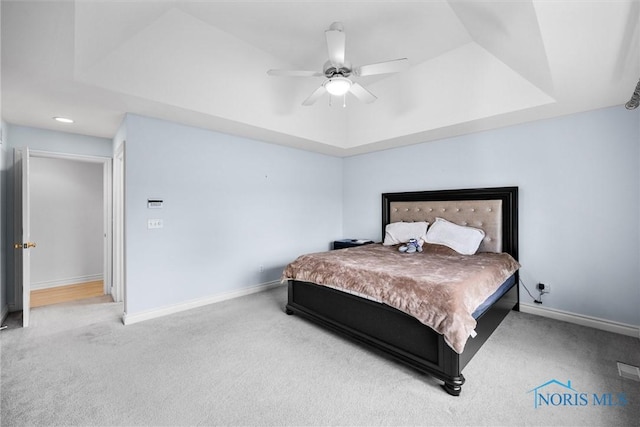 5723 Timbers Grn, Waterville, OH 43566 - carpeted bedroom with a raised ceiling, baseboards, and ceiling fan