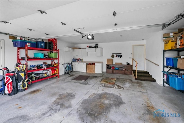 5723 Timbers Grn, Waterville, OH 43566 - garage featuring a garage door opener