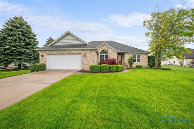 5723 Timbers Grn, Waterville, OH 43566 - ranch-style house with concrete driveway, brick siding, a front yard, and a garage
