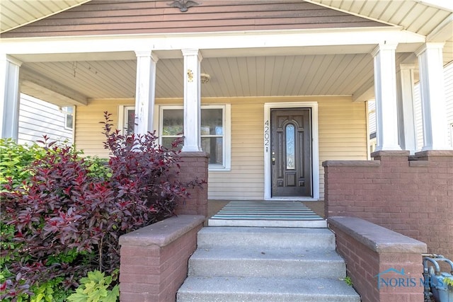 4202 Asbury Dr, Toledo, OH 43612 - property entrance featuring a porch
