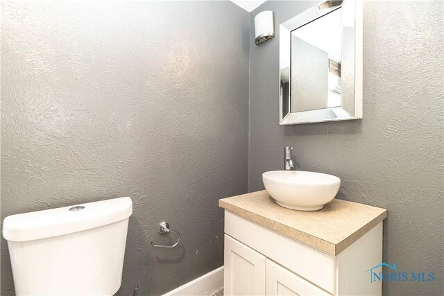 4202 Asbury Dr, Toledo, OH 43612 - half bathroom featuring vanity and toilet