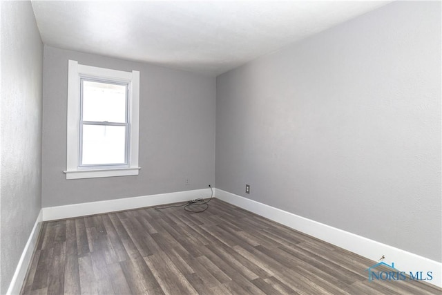 4202 Asbury Dr, Toledo, OH 43612 - empty room with wood finished floors and baseboards