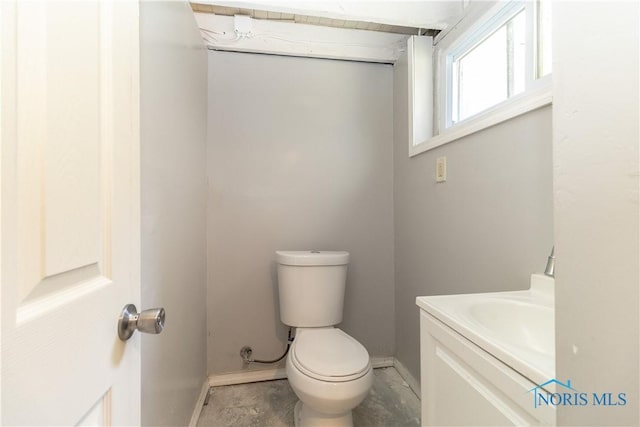 4202 Asbury Dr, Toledo, OH 43612 - bathroom featuring toilet, vanity, and baseboards