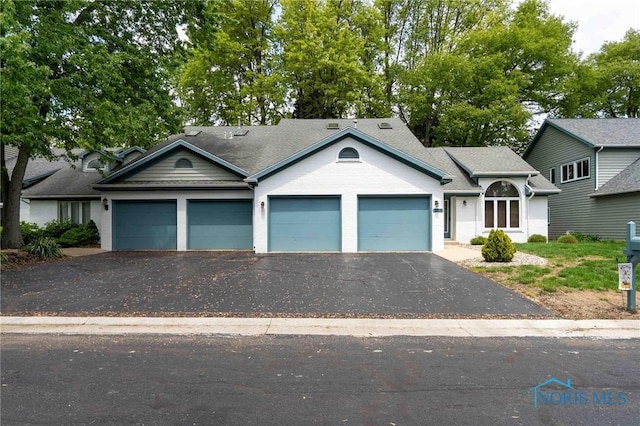 2008 Rush Creek Ct, Findlay, OH 45840 - single story home with an attached garage and asphalt driveway