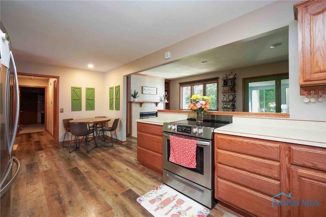 2008 Rush Creek Ct, Findlay, OH 45840 - kitchen featuring stainless steel appliances, light countertops, wood finished floors, and recessed lighting