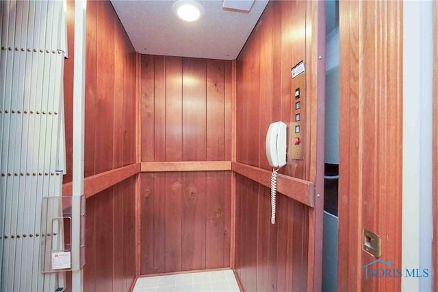 2008 Rush Creek Ct, Findlay, OH 45840 - elevator with wooden walls