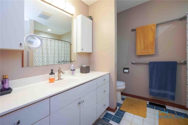 2008 Rush Creek Ct, Findlay, OH 45840 - bathroom with vanity, tile patterned flooring, and toilet