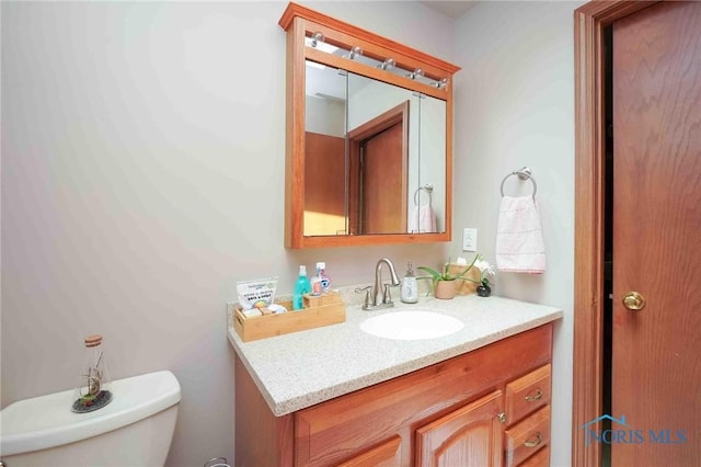 2008 Rush Creek Ct, Findlay, OH 45840 - bathroom featuring toilet and vanity