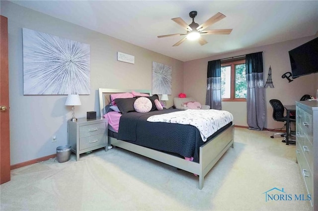 2008 Rush Creek Ct, Findlay, OH 45840 - bedroom featuring light carpet, a desk, baseboards, and ceiling fan