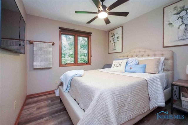 2008 Rush Creek Ct, Findlay, OH 45840 - bedroom featuring wood finished floors, baseboards, and ceiling fan