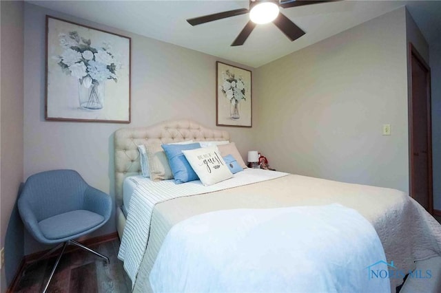 2008 Rush Creek Ct, Findlay, OH 45840 - bedroom with wood finished floors, a ceiling fan, and baseboards