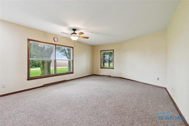 2454 Adams Ridge Rd, Defiance, OH 43512 - empty room featuring carpet, a ceiling fan, and baseboards