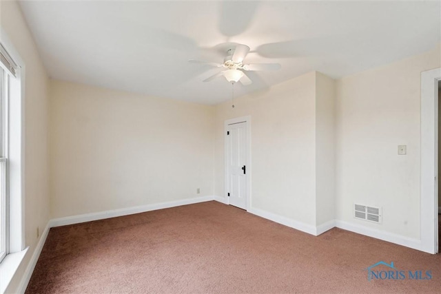2454 Adams Ridge Rd, Defiance, OH 43512 - carpeted empty room featuring a ceiling fan and baseboards