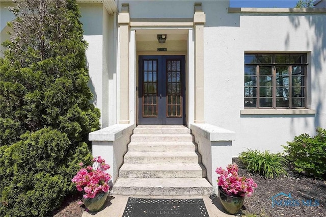 218 E Mcpherson Ave, Findlay, OH 45840 - entrance to property featuring french doors and stucco siding