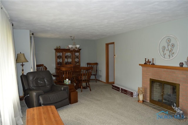 309 Huron Rd, Findlay, OH 45840 - living area with carpet flooring, a brick fireplace, baseboards, and a textured ceiling