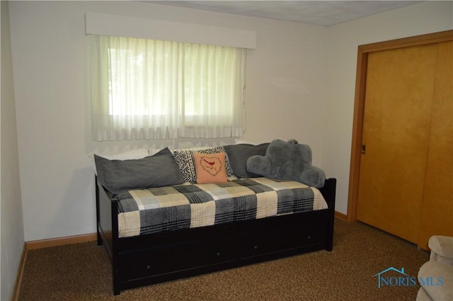 309 Huron Rd, Findlay, OH 45840 - carpeted bedroom featuring baseboards