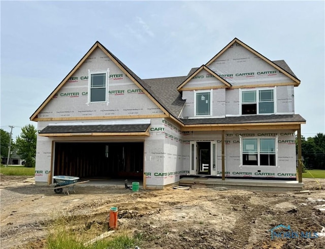 1800 Caleb Ct, Waterville, OH 43566 - unfinished property with a garage, a shingled roof, and a porch