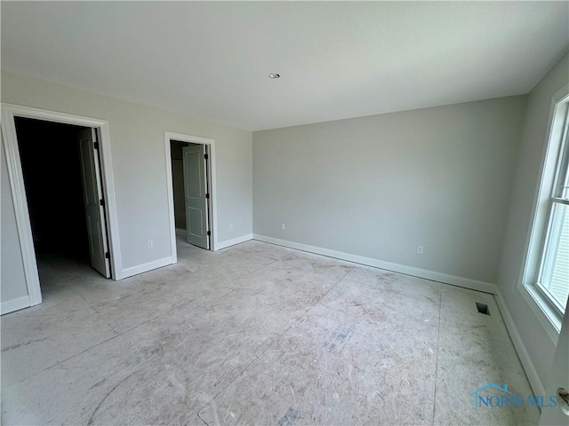 1924 Caleb Ct, Waterville, OH 43566 - unfurnished bedroom with baseboards