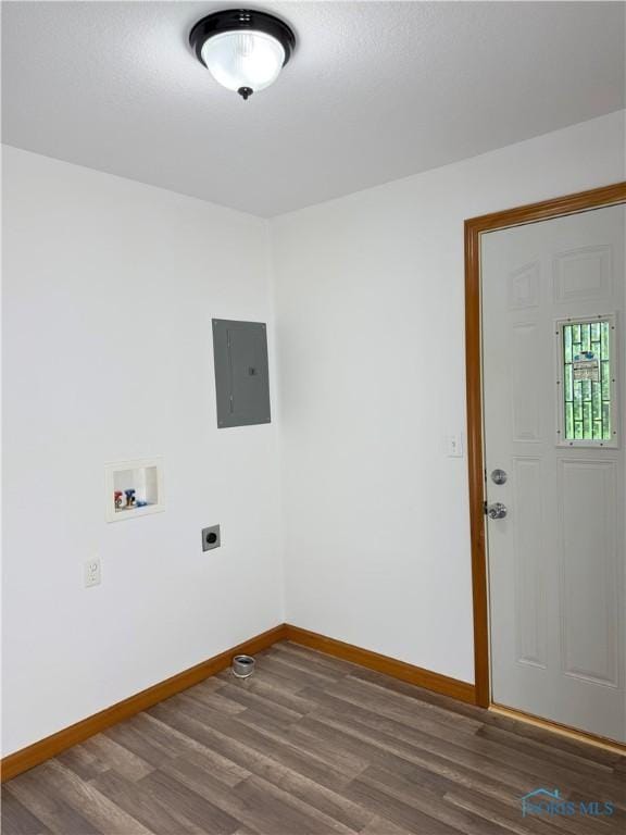 310 N Theresa St, Holgate, OH 43527 - laundry room with electric panel, washer hookup, baseboards, wood finished floors, and hookup for an electric dryer