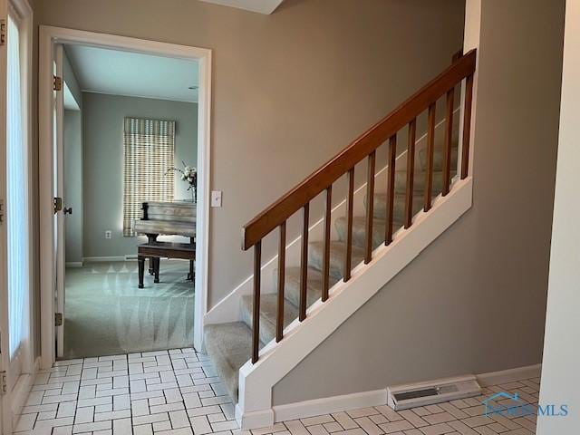 6047 Peppermill Dr, Sylvania, OH 43560 - stairway featuring baseboards and carpet floors