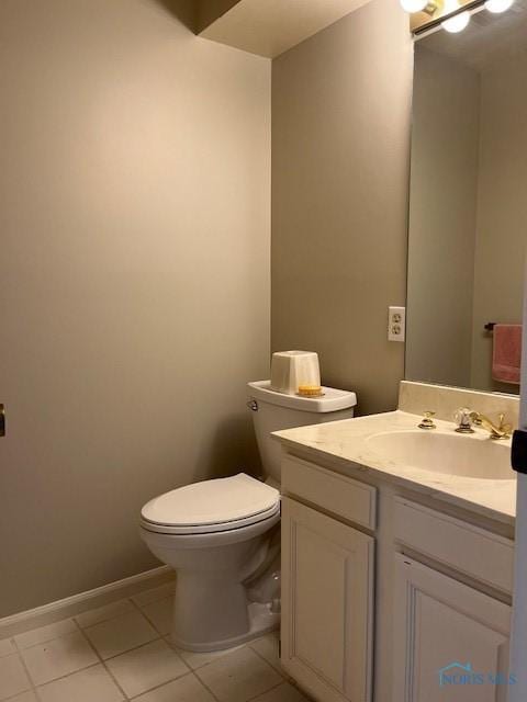 6047 Peppermill Dr, Sylvania, OH 43560 - bathroom featuring toilet, vanity, tile patterned floors, and baseboards