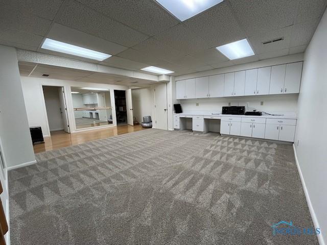 6047 Peppermill Dr, Sylvania, OH 43560 - unfurnished office with light carpet, baseboards, and a drop ceiling