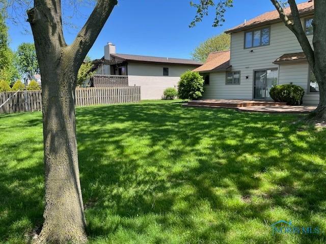 6047 Peppermill Dr, Sylvania, OH 43560 - view of yard with a deck