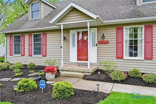 805 N Hill Trl, Findlay, OH 45840 - doorway to property featuring roof with shingles