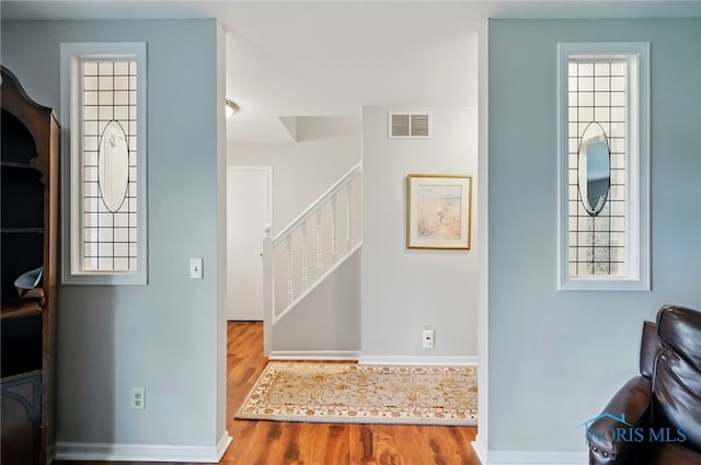 805 N Hill Trl, Findlay, OH 45840 - entrance foyer featuring wood finished floors, stairs, and baseboards