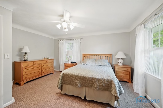 125 Carolin Ct, Perrysburg, OH 43551 - bedroom featuring light colored carpet, a ceiling fan, and baseboards