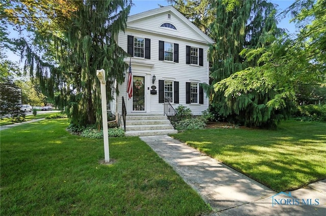 232 E Wayne St, Maumee, OH 43537 - greek revival inspired property featuring a front yard