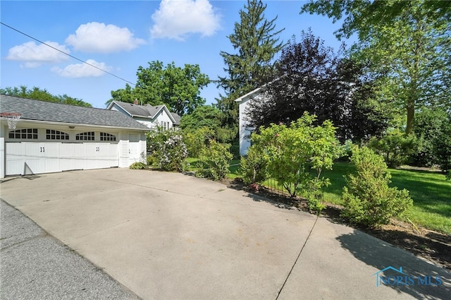 232 E Wayne St, Maumee, OH 43537 - view of side of property with a garage
