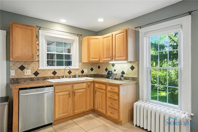 232 E Wayne St, Maumee, OH 43537 - kitchen with stainless steel dishwasher, radiator, decorative backsplash, light tile patterned floors, and light brown cabinets