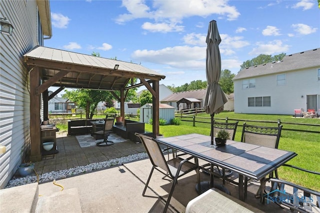 548 Niagara Ave, Holland, OH 43528 - view of patio featuring outdoor dining area, a storage shed, an outdoor structure, and a gazebo
