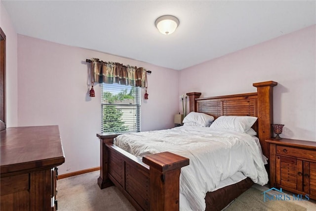 548 Niagara Ave, Holland, OH 43528 - bedroom with carpet floors and baseboards