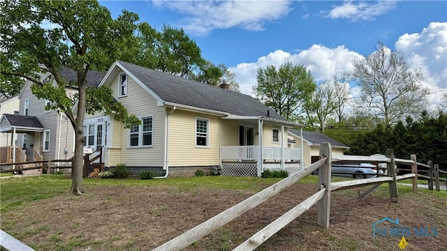 2659 Oak Grove Pl, Toledo, OH 43613 - view of front of house featuring a chimney and roof with shingles