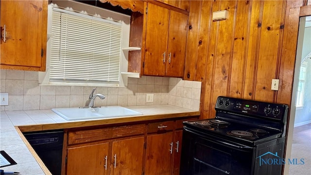 2659 Oak Grove Pl, Toledo, OH 43613 - kitchen featuring black appliances, a sink, tile counters, open shelves, and tasteful backsplash