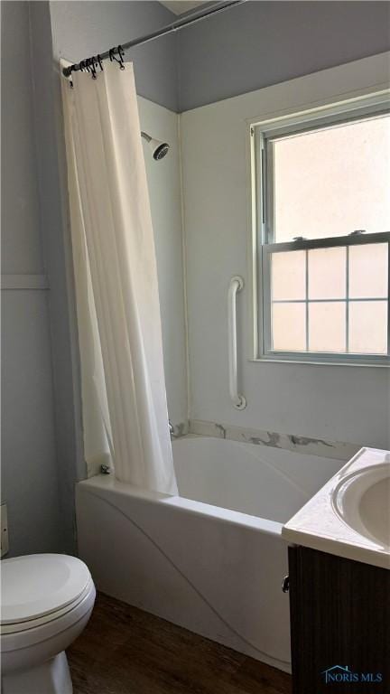 2659 Oak Grove Pl, Toledo, OH 43613 - bathroom featuring wood finished floors, shower / bath combination with curtain, toilet, and vanity