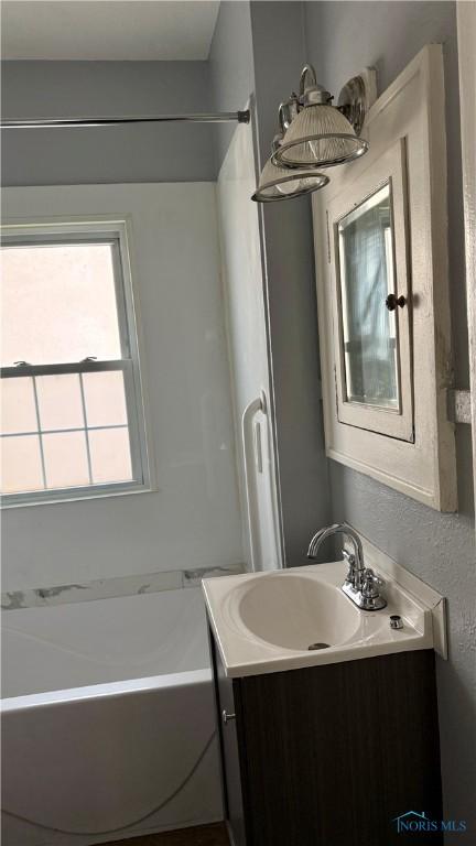 2659 Oak Grove Pl, Toledo, OH 43613 - full bathroom with a tub to relax in and vanity