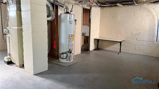 2659 Oak Grove Pl, Toledo, OH 43613 - unfinished below grade area featuring water heater and concrete block wall