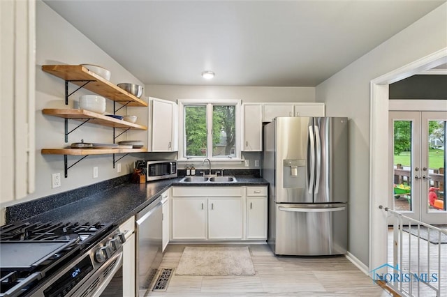 3555 Island Ave, Toledo, OH 43614 - kitchen featuring stainless steel appliances, a sink, french doors, and plenty of natural light