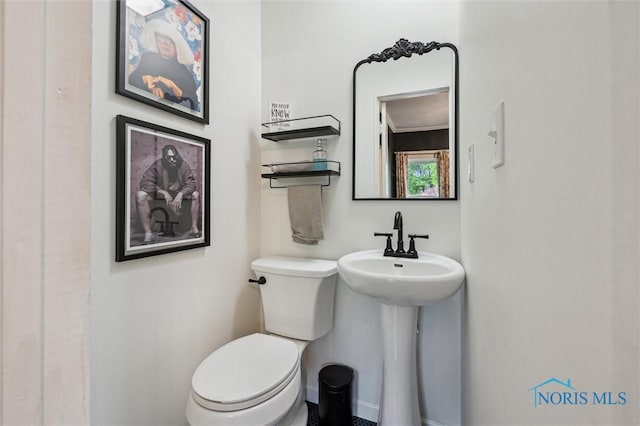 3555 Island Ave, Toledo, OH 43614 - half bath with toilet and a sink