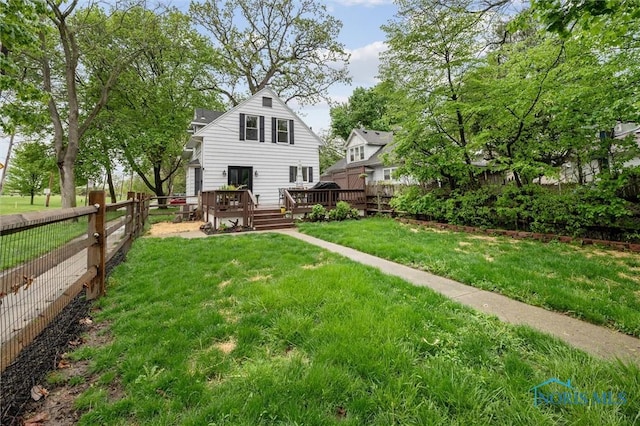 3555 Island Ave, Toledo, OH 43614 - rear view of house with a deck
