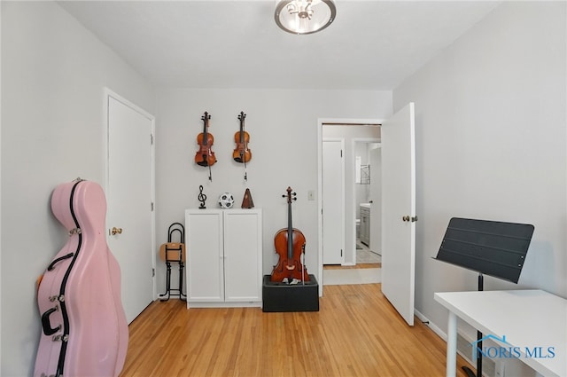 bedroom featuring light wood finished floors