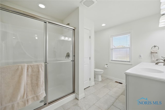9274 Shaffer St, Findlay, OH 45840 - bathroom with a shower stall, baseboards, toilet, tile patterned floors, and recessed lighting