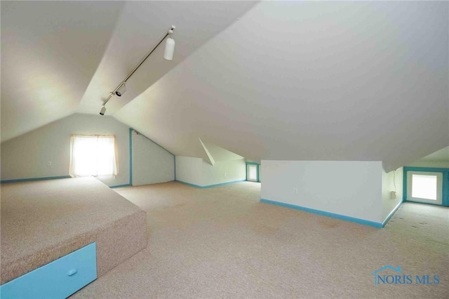 1211 S Main St, Findlay, OH 45840 - bonus room featuring carpet, lofted ceiling, and baseboards